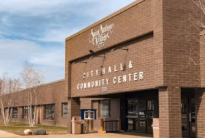 Brick Saint Anthony Village City Hall and Community Center building with its sign